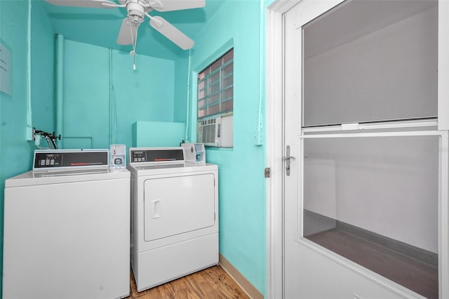 washroom featuring light wood-type flooring, separate washer and dryer, and ceiling fan