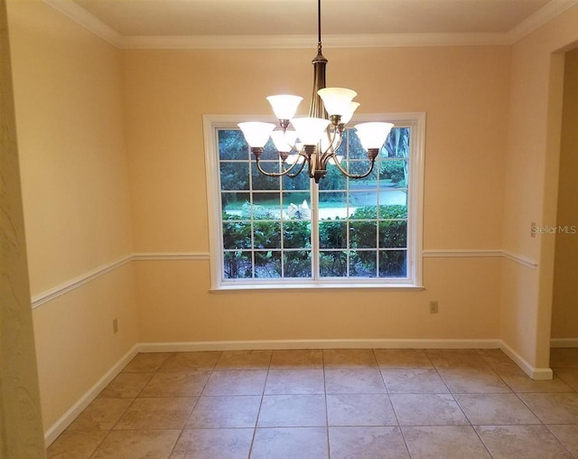 unfurnished dining area featuring light tile patterned floors, an inviting chandelier, and crown molding