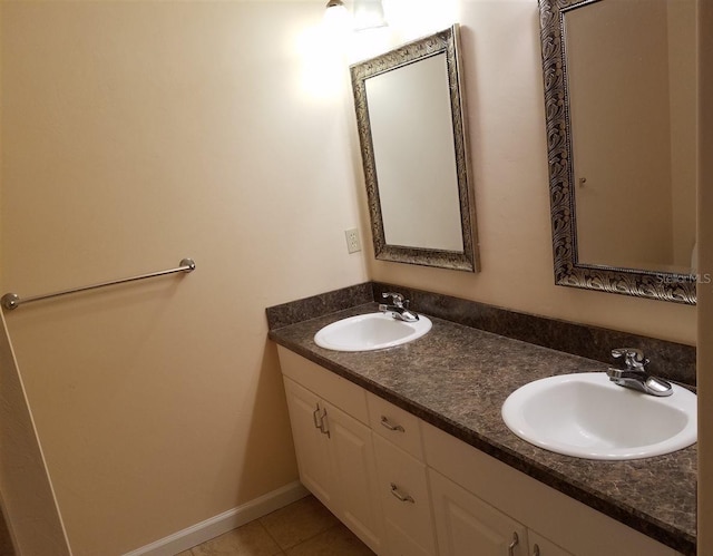 bathroom with vanity and tile patterned floors