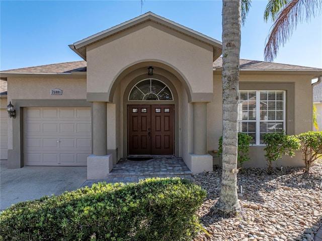 entrance to property featuring a garage