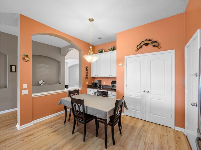 dining room featuring light hardwood / wood-style flooring