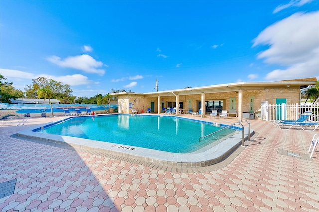 view of pool featuring a patio