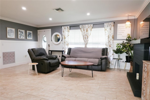 living room with ornamental molding