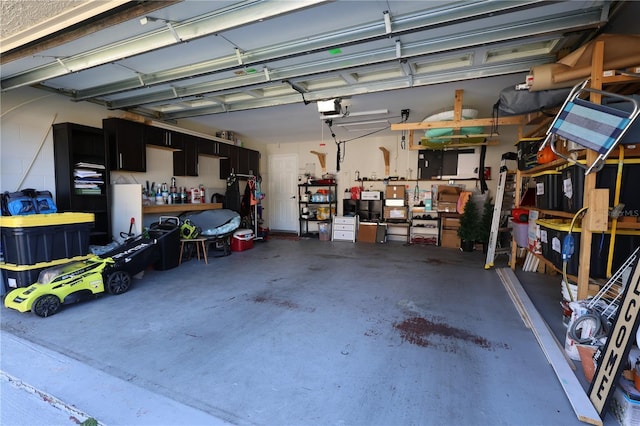 garage featuring a garage door opener