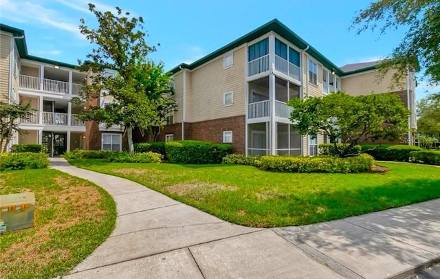 exterior space with a yard