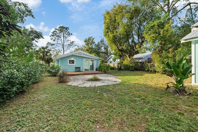 view of yard with a deck