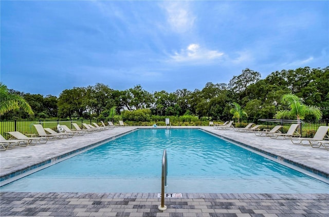 view of pool featuring a patio area