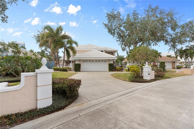 view of front of property featuring a garage