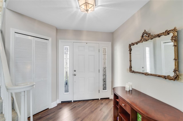 foyer with dark wood-type flooring