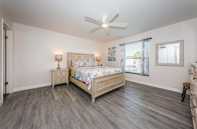 bedroom featuring ceiling fan and dark wood-type flooring