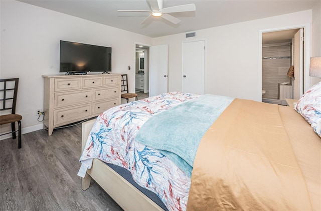 bedroom featuring ensuite bath, ceiling fan, and hardwood / wood-style floors