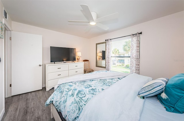 bedroom featuring hardwood / wood-style floors and ceiling fan