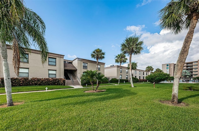 surrounding community featuring a lawn