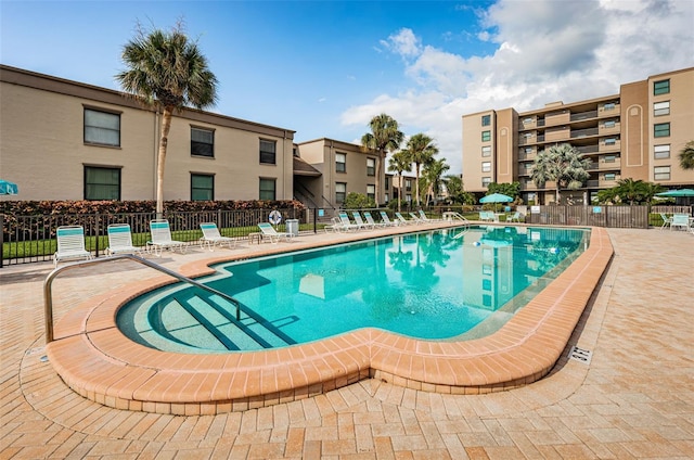 view of pool featuring a patio area