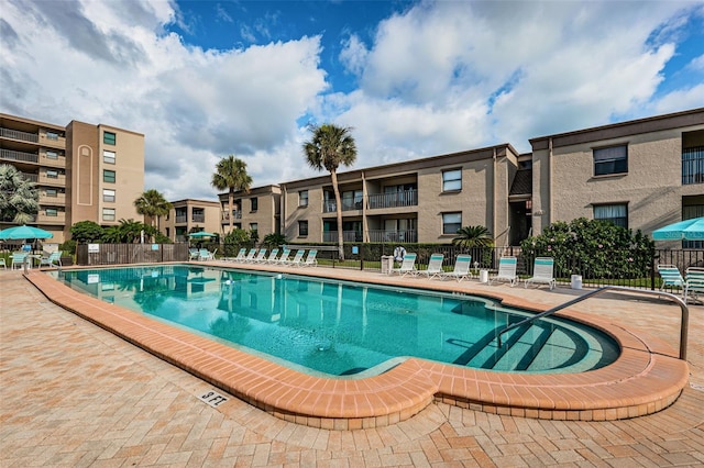 view of pool featuring a patio area