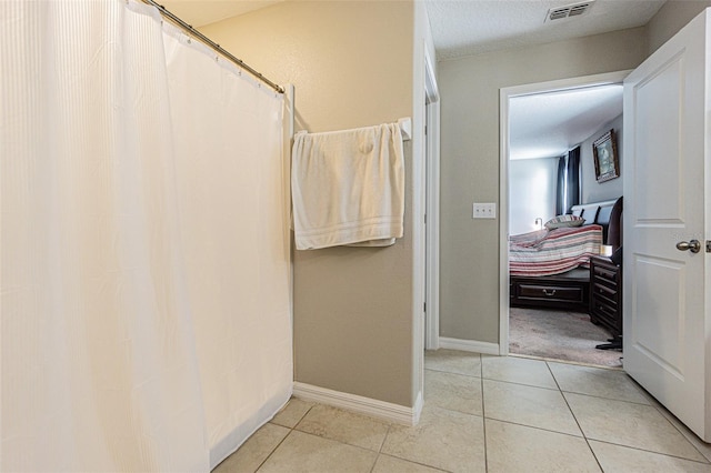 bathroom featuring tile patterned floors