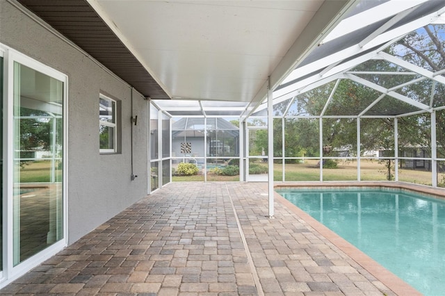 view of pool featuring a lanai and a patio area