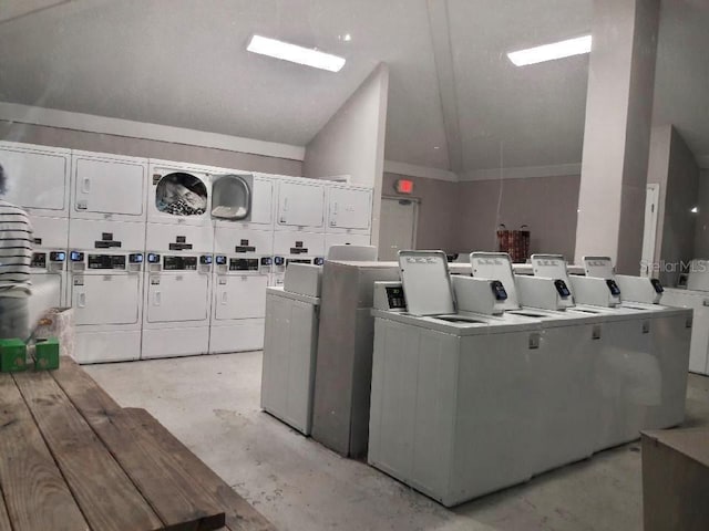 clothes washing area featuring washing machine and dryer and stacked washer and clothes dryer