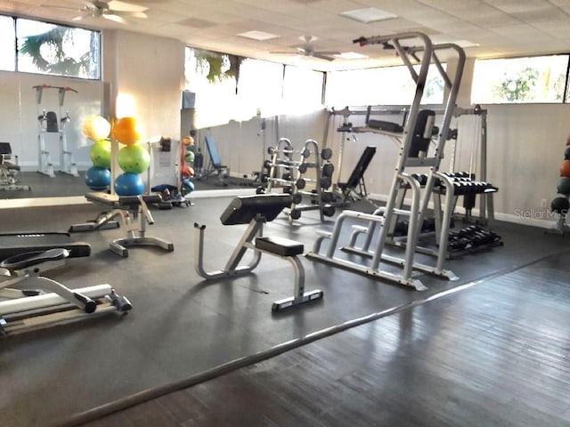 exercise room with ceiling fan