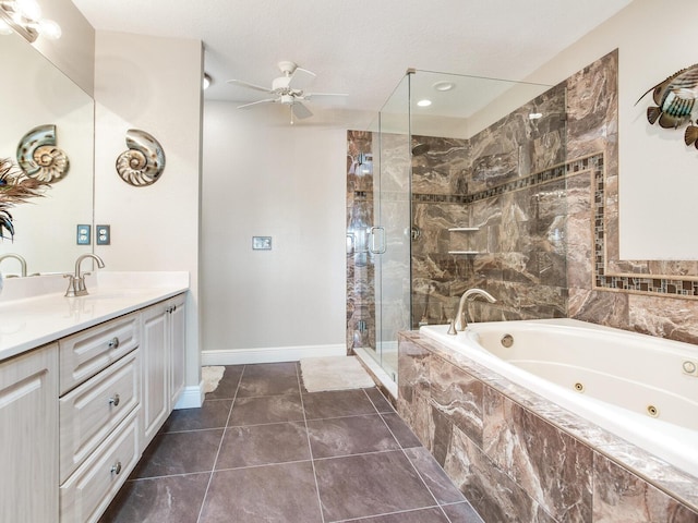 bathroom with ceiling fan, tile patterned flooring, separate shower and tub, a textured ceiling, and vanity