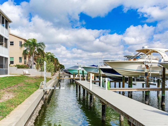 dock area with a water view