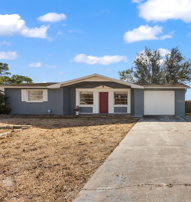 single story home featuring a garage