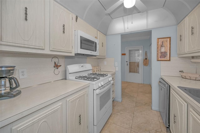 kitchen with ceiling fan, white appliances, decorative backsplash, and light tile patterned flooring