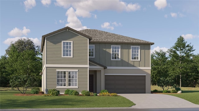 view of front of house with a garage and a front yard