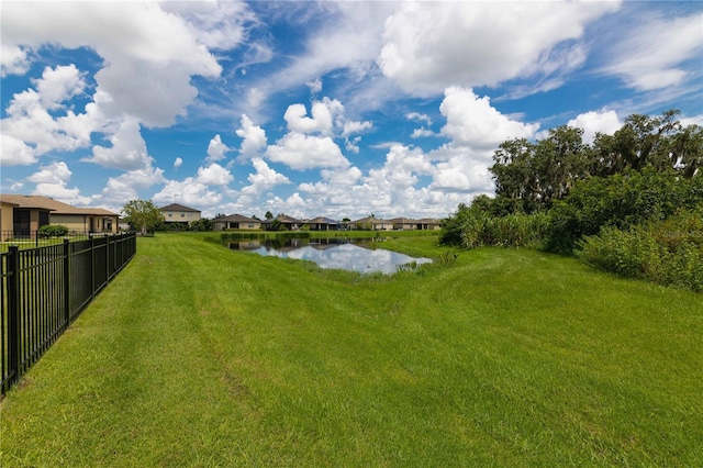 view of yard with a water view