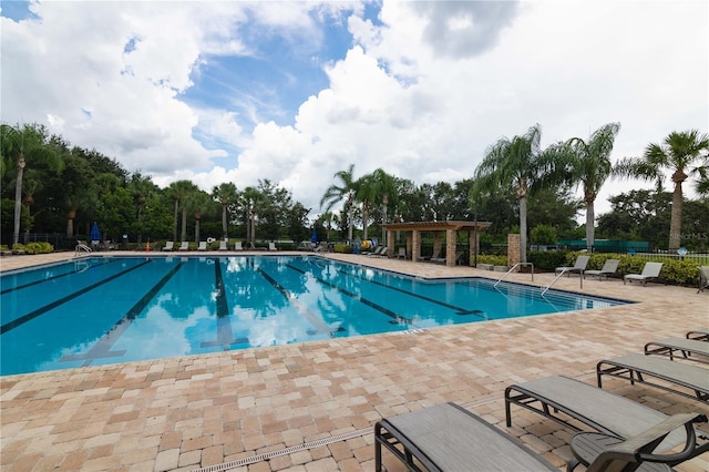 view of pool featuring a patio