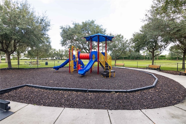 view of jungle gym with a yard