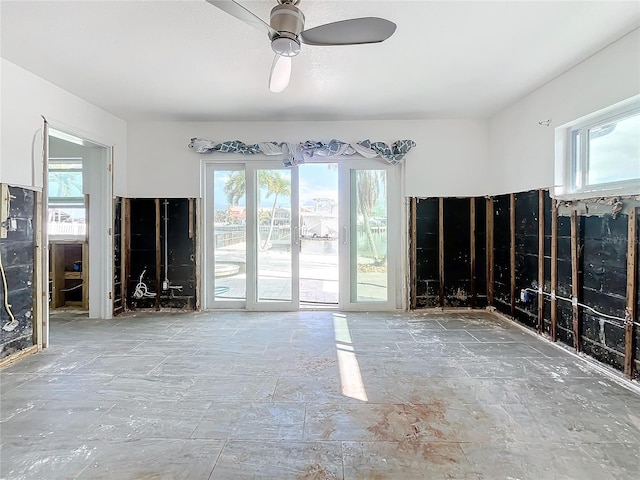 unfurnished room with ceiling fan