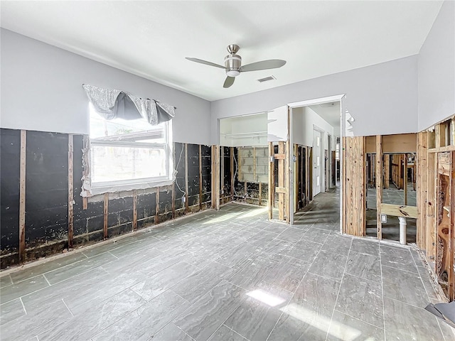 spare room featuring ceiling fan