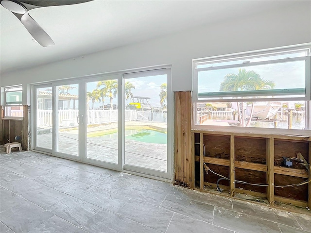 entryway featuring ceiling fan