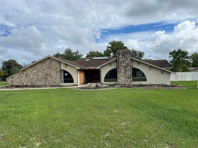 exterior space featuring a front lawn