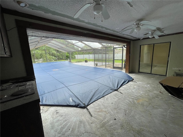 view of pool featuring ceiling fan