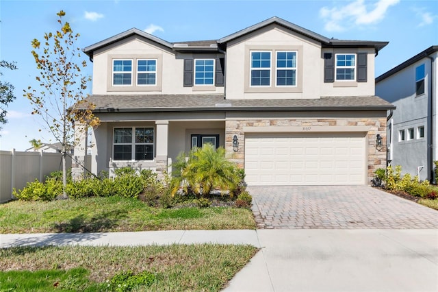 view of front of property with a garage