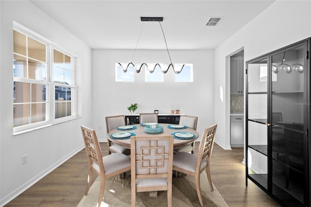 dining room featuring dark hardwood / wood-style floors