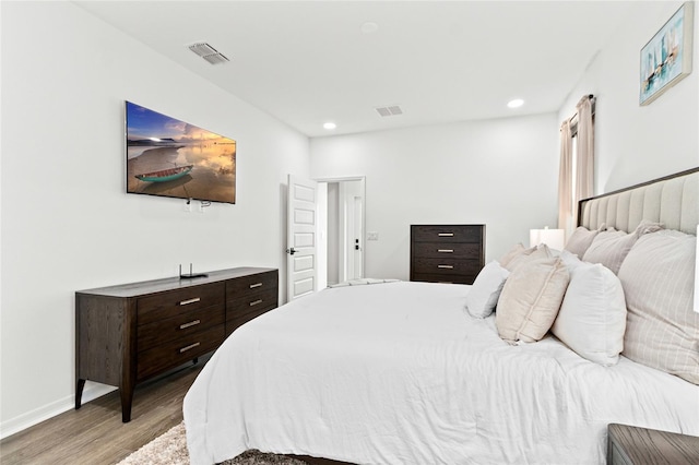 bedroom featuring light wood-type flooring