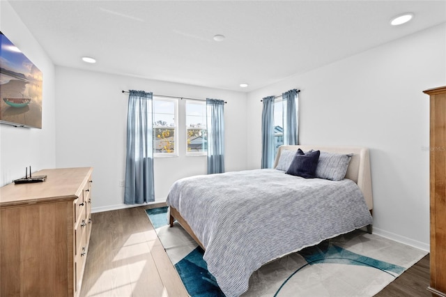 bedroom with light hardwood / wood-style flooring