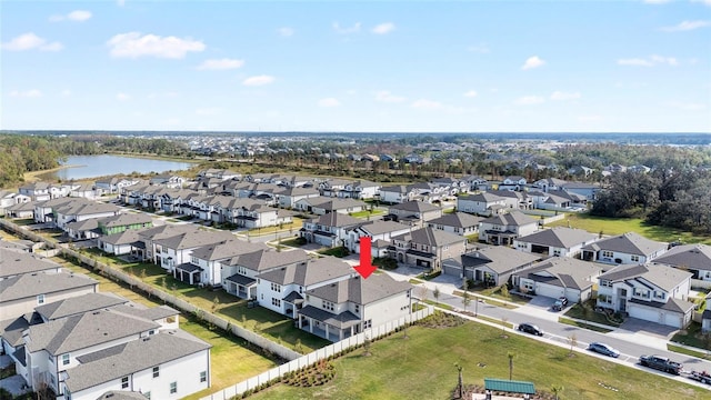 drone / aerial view with a water view