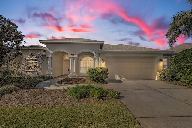 view of front of property featuring a garage