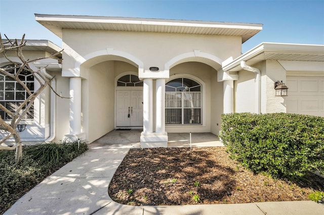 entrance to property featuring a garage