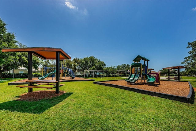 view of play area featuring a lawn