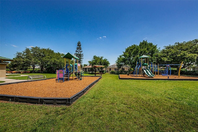 view of play area featuring a lawn