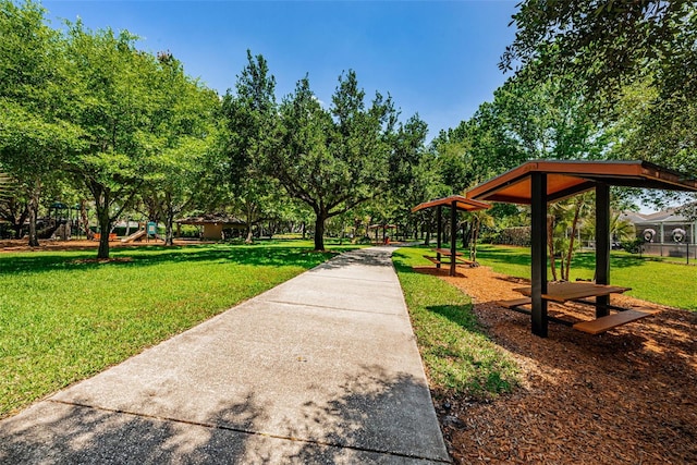 view of home's community with a lawn