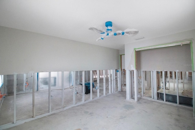 interior space featuring concrete floors