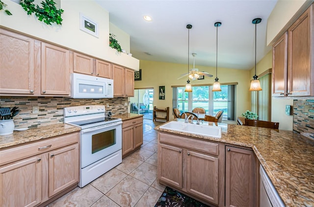 kitchen featuring sink, tasteful backsplash, vaulted ceiling, decorative light fixtures, and white appliances