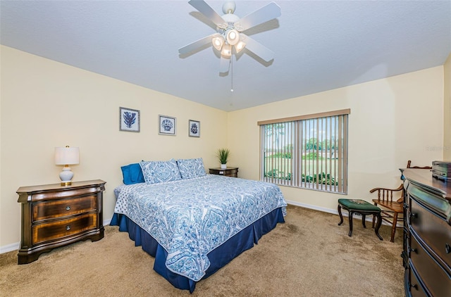 bedroom featuring ceiling fan and carpet floors