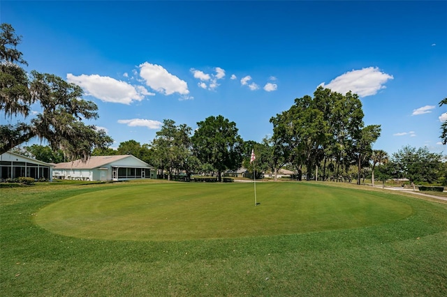 surrounding community featuring a lawn